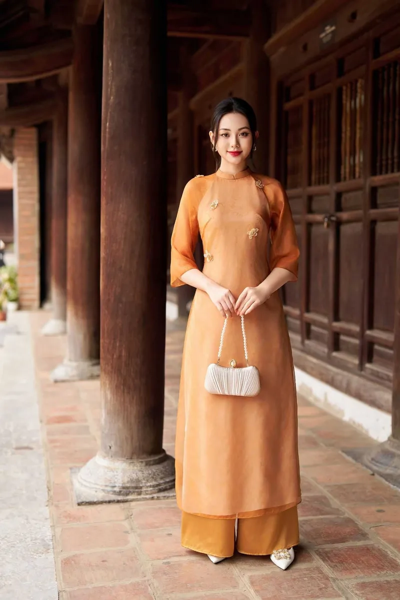 Kiểu dáng thanh lịch tôn nét duyên áo dài tay lỡ cổ tròn