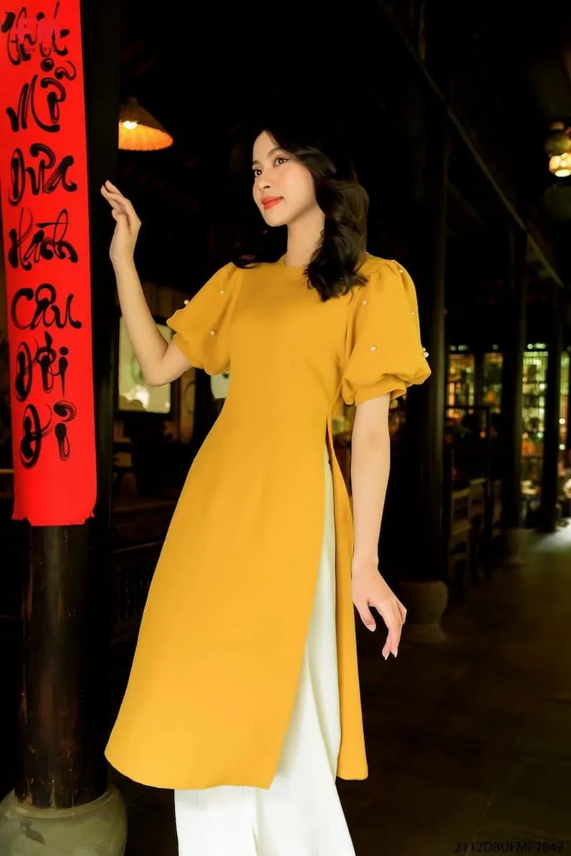 Nét xưa sang trọng hòa quyện áo dài tay phồng truyền thống