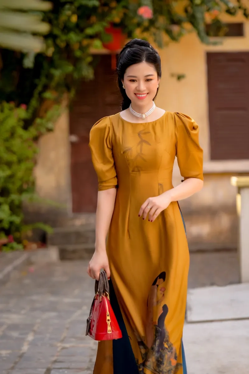 Phong cách mới mẻ nổi bật cùng áo dài tay phồng cách tân