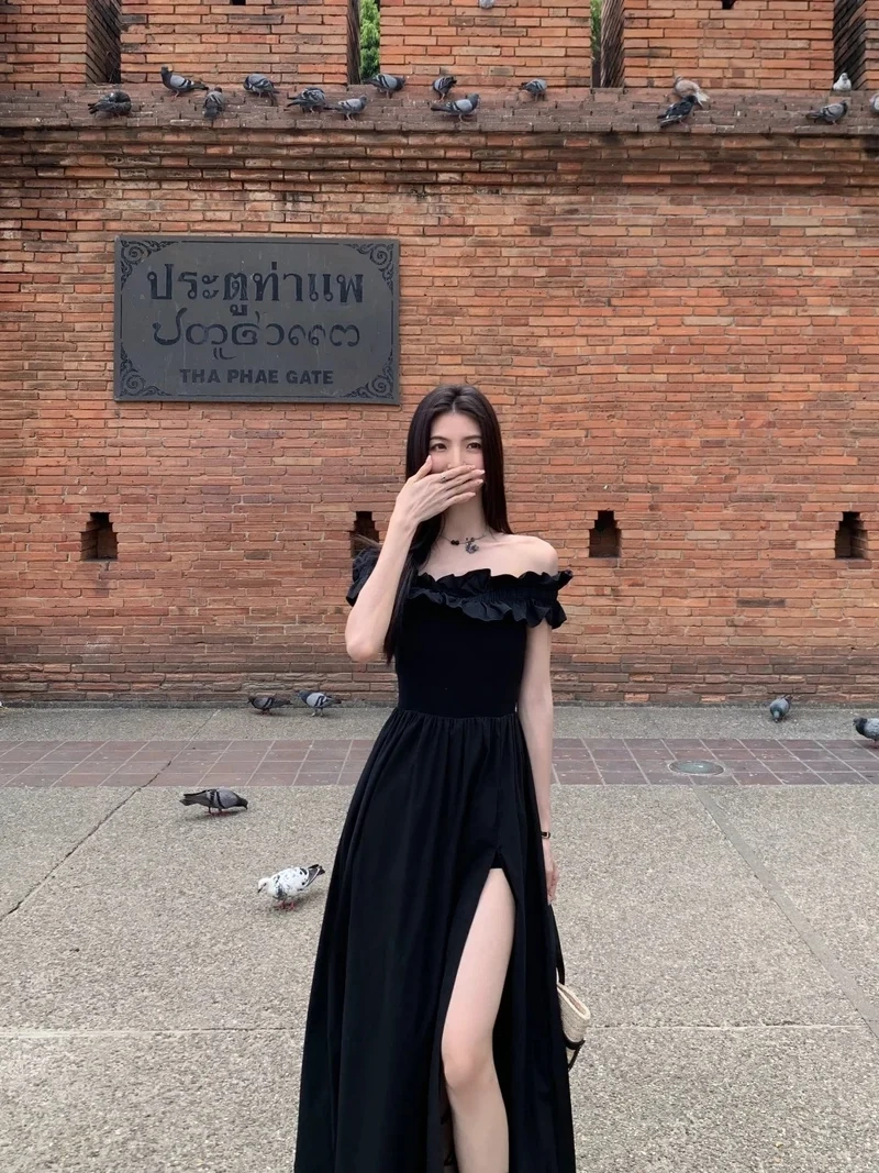 Đầm xẻ đùi cao tôn vòng eo thanh mảnh