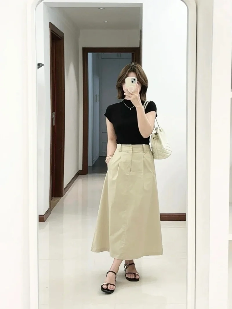 Phái đẹp yêu thích Váy chữ A dáng dài vì dễ mặc