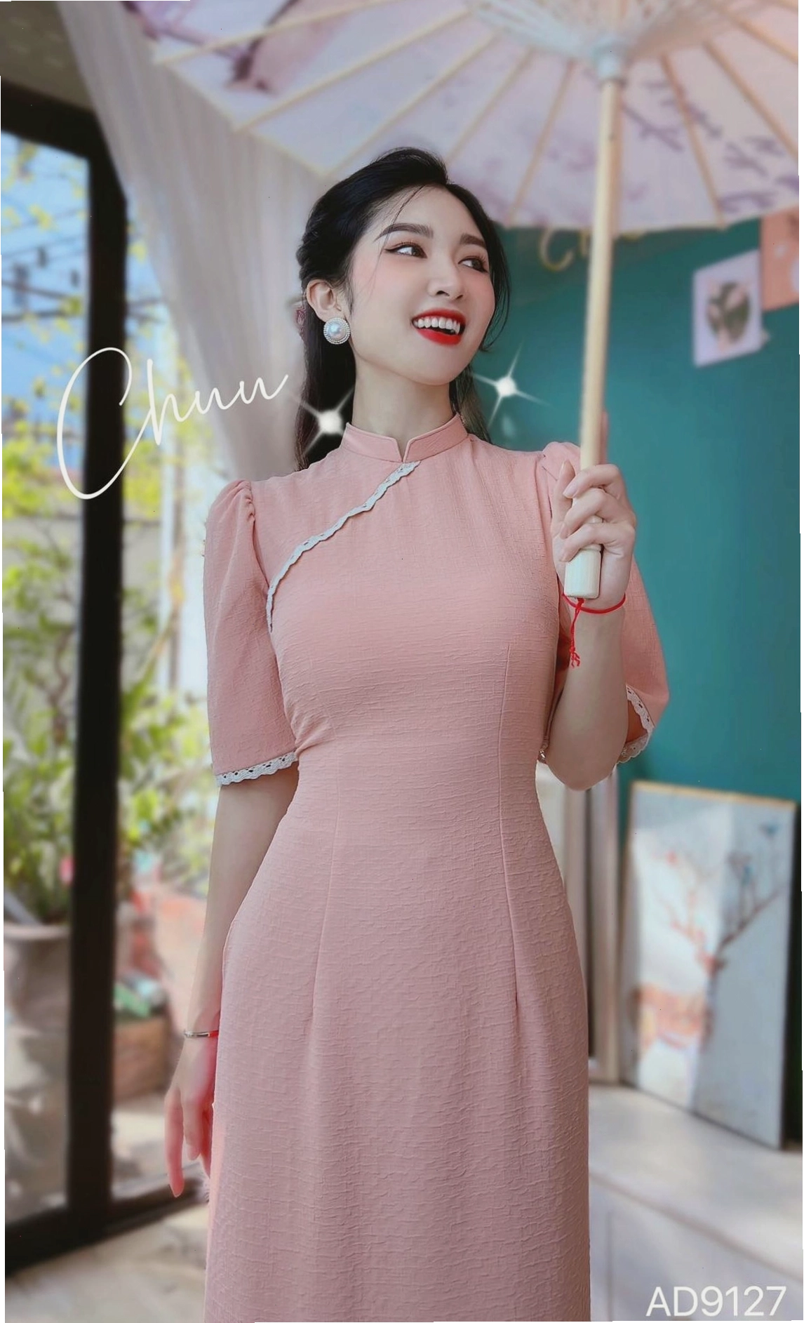 Áo dài đồng phục vân dứa, tay loe màu xanh lá
