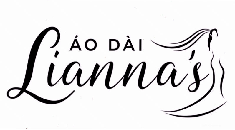 Áo dài gấm màu xanh ngọc lục bảo với họa tiết chìm tinh tế