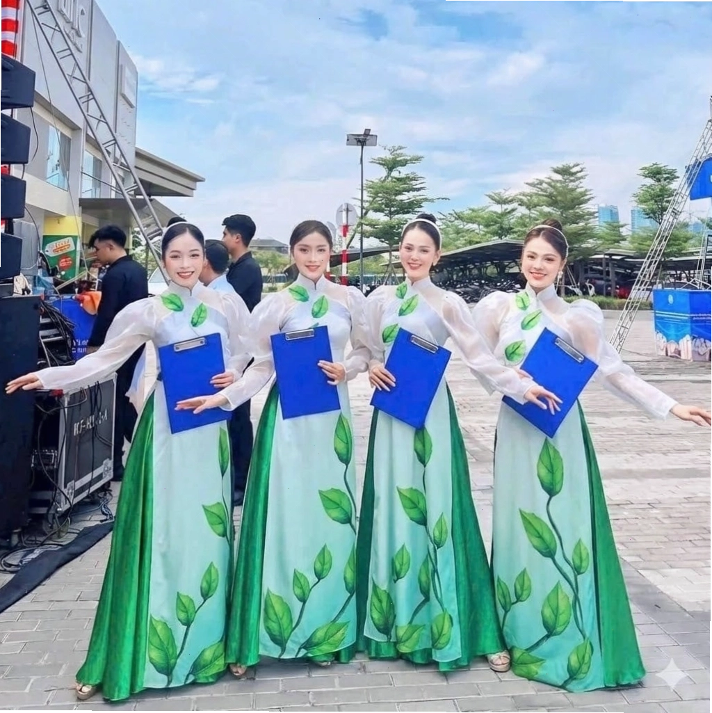 Áo dài múa cổ điển với tay phồng nhẹ, cổ tròn, chất liệu lụa trơn màu hồng phấn
