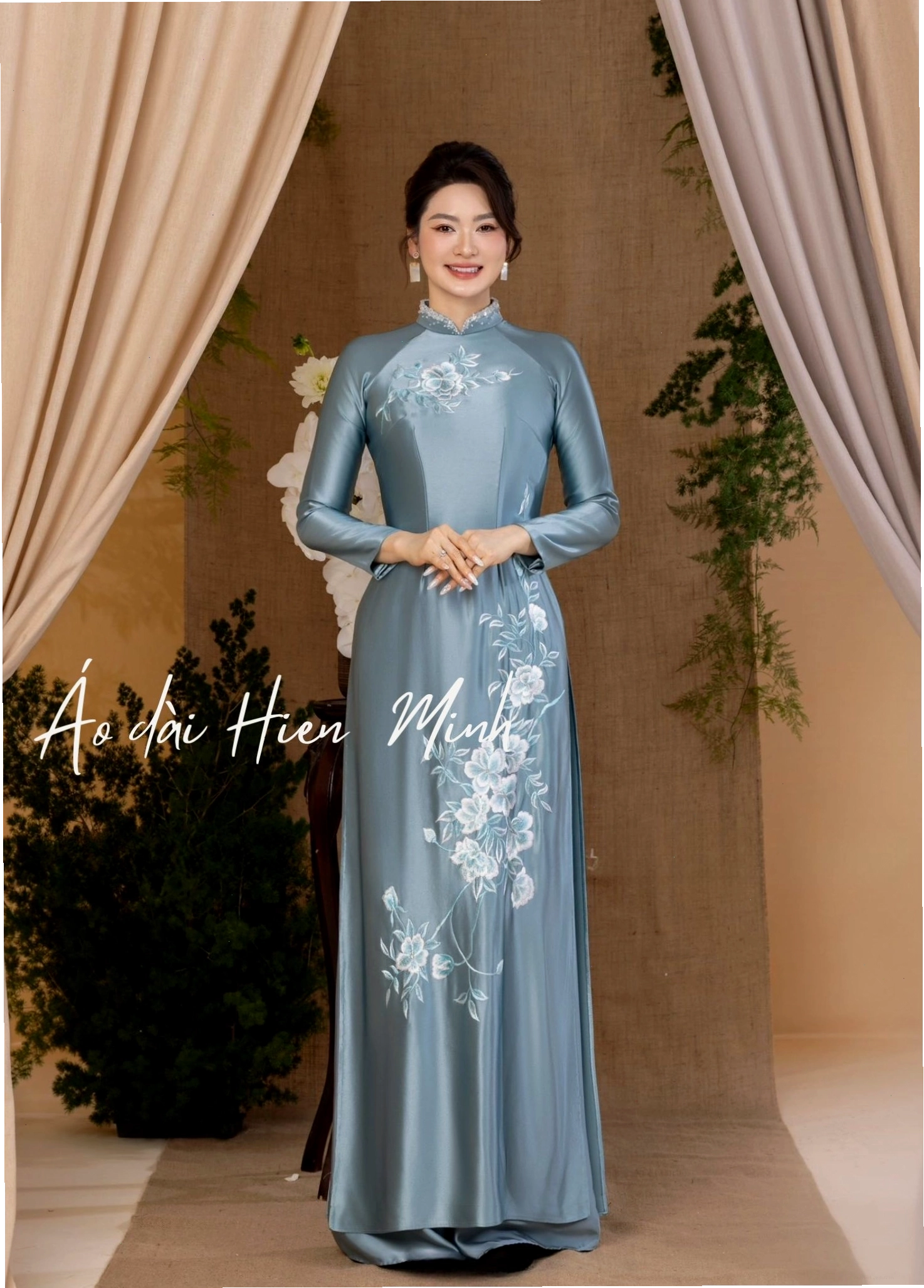 Áo dài sui gia cao cấp với tay lỡ, cổ tròn duyên dáng