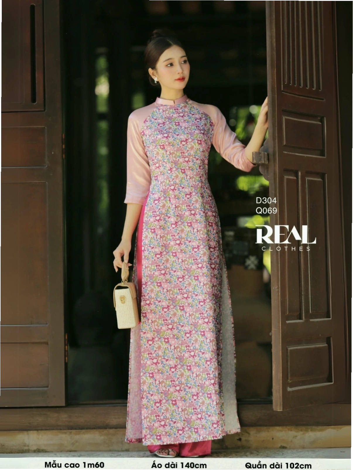 Áo dài truyền thống hồng cánh sen họa tiết hoa lan