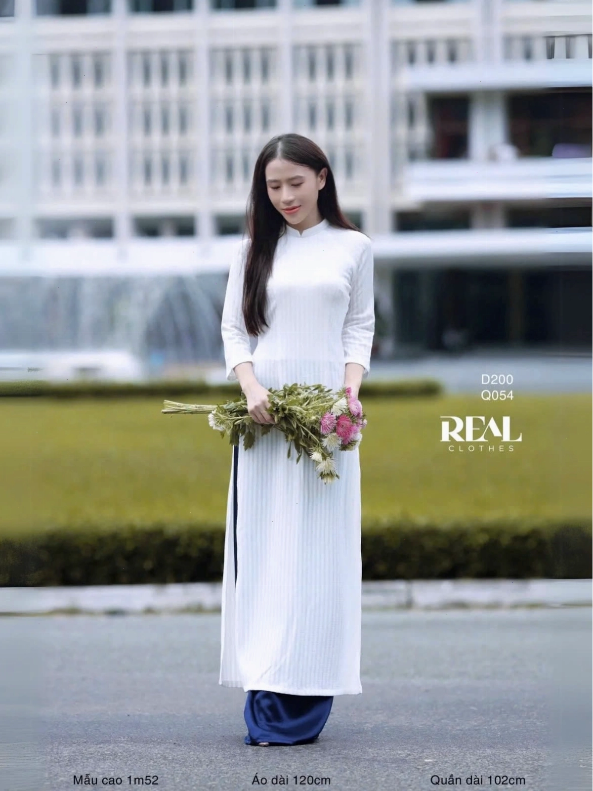 Áo dài truyền thống muse màu hồng pastel đính kết tỉ mỉ
