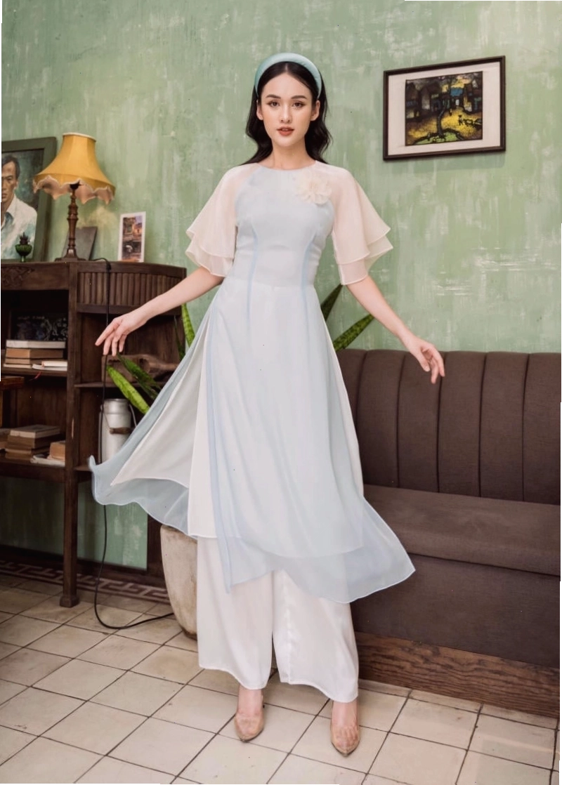 Áo dài voan tay loe cổ V màu hồng pastel dịu dàng