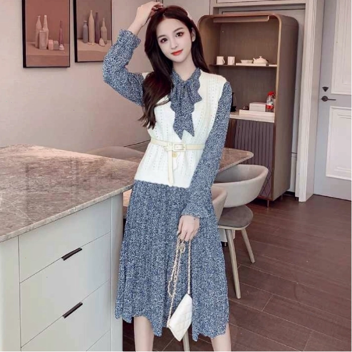 Áo gile len chiết eo giúp nàng khéo léo khoe vòng 2 nhỏ nhắn khi phối cùng váy hoa nhí