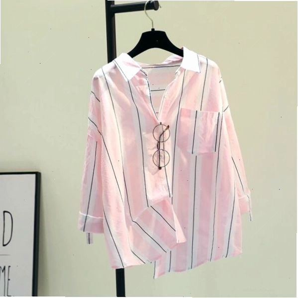 Áo sơ mi dáng rộng kẻ sọc vàng hồng, chất liệu cotton, phong cách Hàn Quốc.