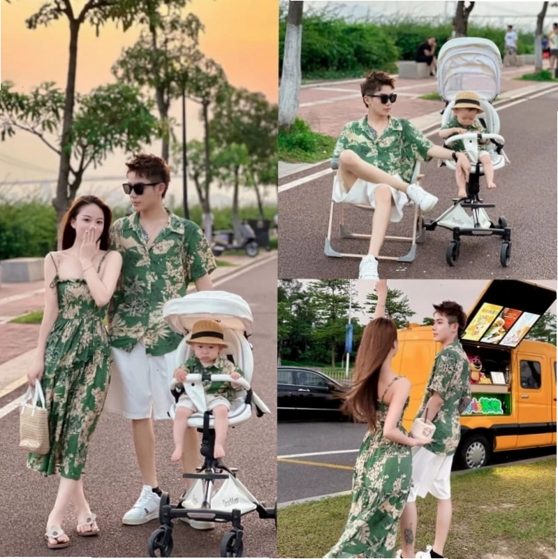 Bố mẹ và con gái mặc set đồ gia đình đi biển màu trắng với họa tiết sọc ngang, đang tươi cười trên bãi biển