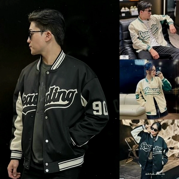 Cặp đôi diện áo khoác bomber nam nữ màu đen và be, tạo dáng nhìn nhau tình tứ