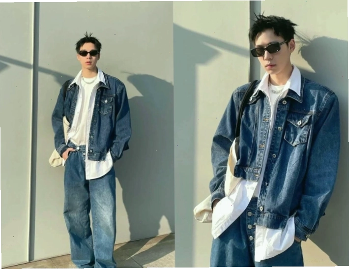 Cặp đôi diện áo sơ mi denim và quần jeans xanh đậm, tạo dáng sành điệu