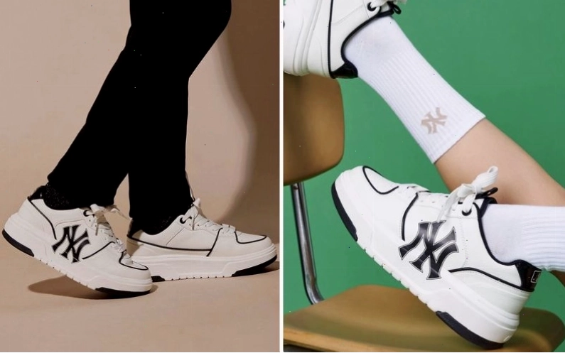 Cặp đôi tạo dáng nhí nhảnh trước bức tường graffiti với trang phục MLB và giày MLB