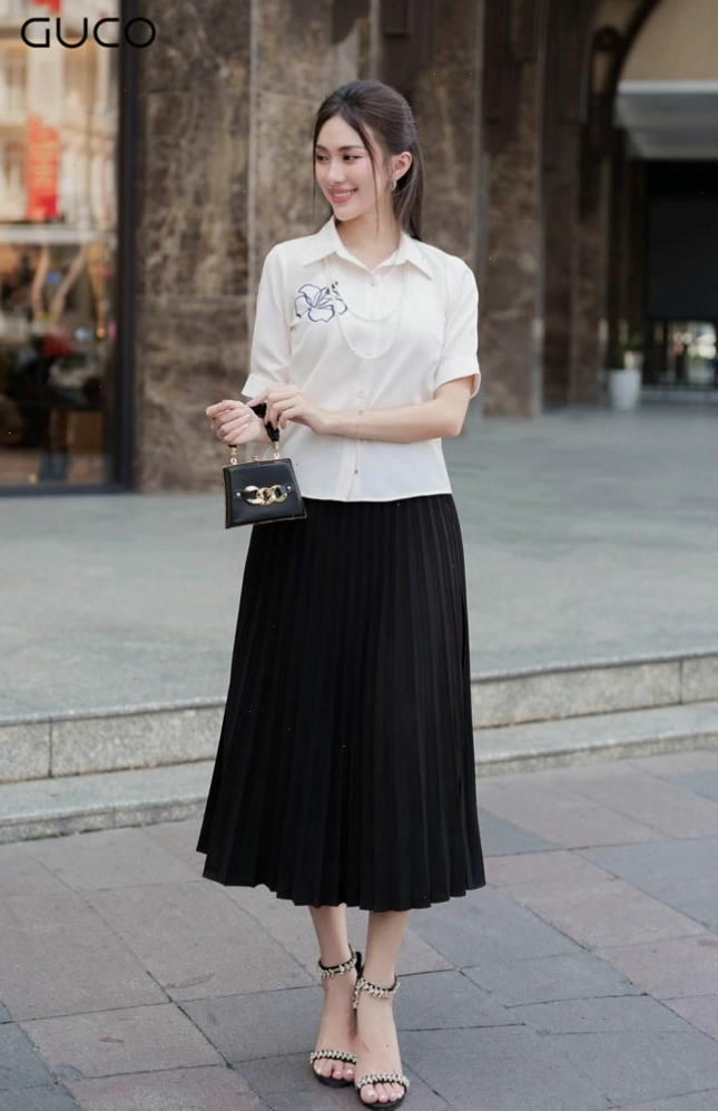 CHÂN VÁY DẬP LI QUẠT - ĐEN CV191D