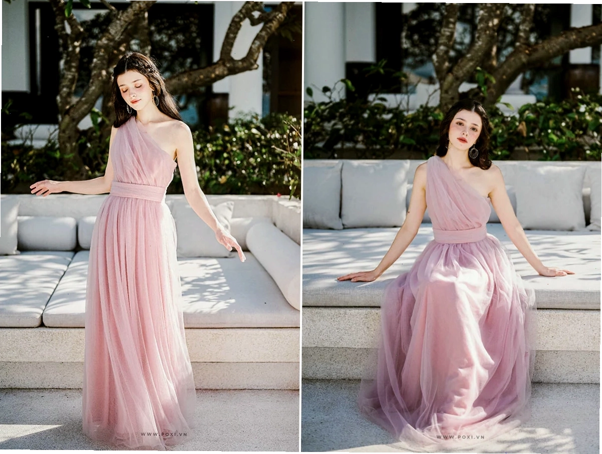 Cô gái mặc váy maxi dáng dài màu hồng pastel, cổ tròn, tay ngắn