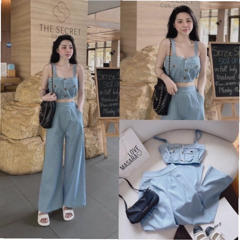 Cô gái phối quần jean ống suông với áo blouse tay phồng và sandal cao gót