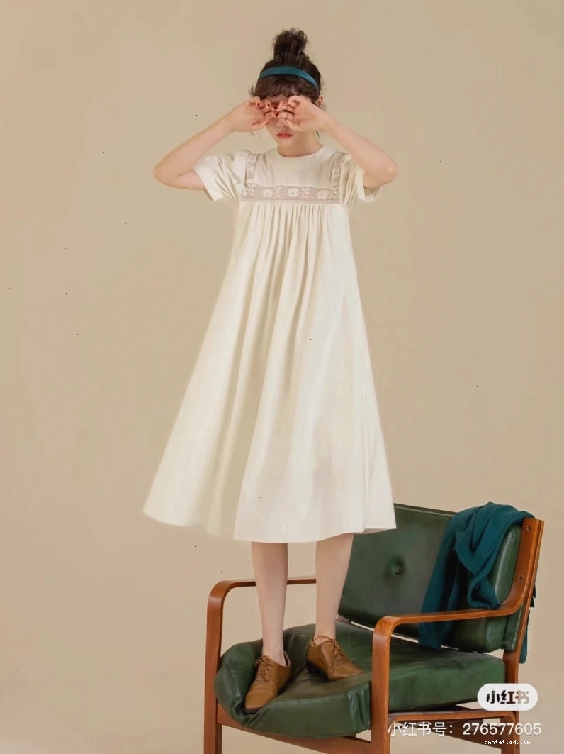 Đầm babydoll dáng suông tay phồng màu hồng pastel, cổ tròn, chất liệu vải linen mỏng nhẹ