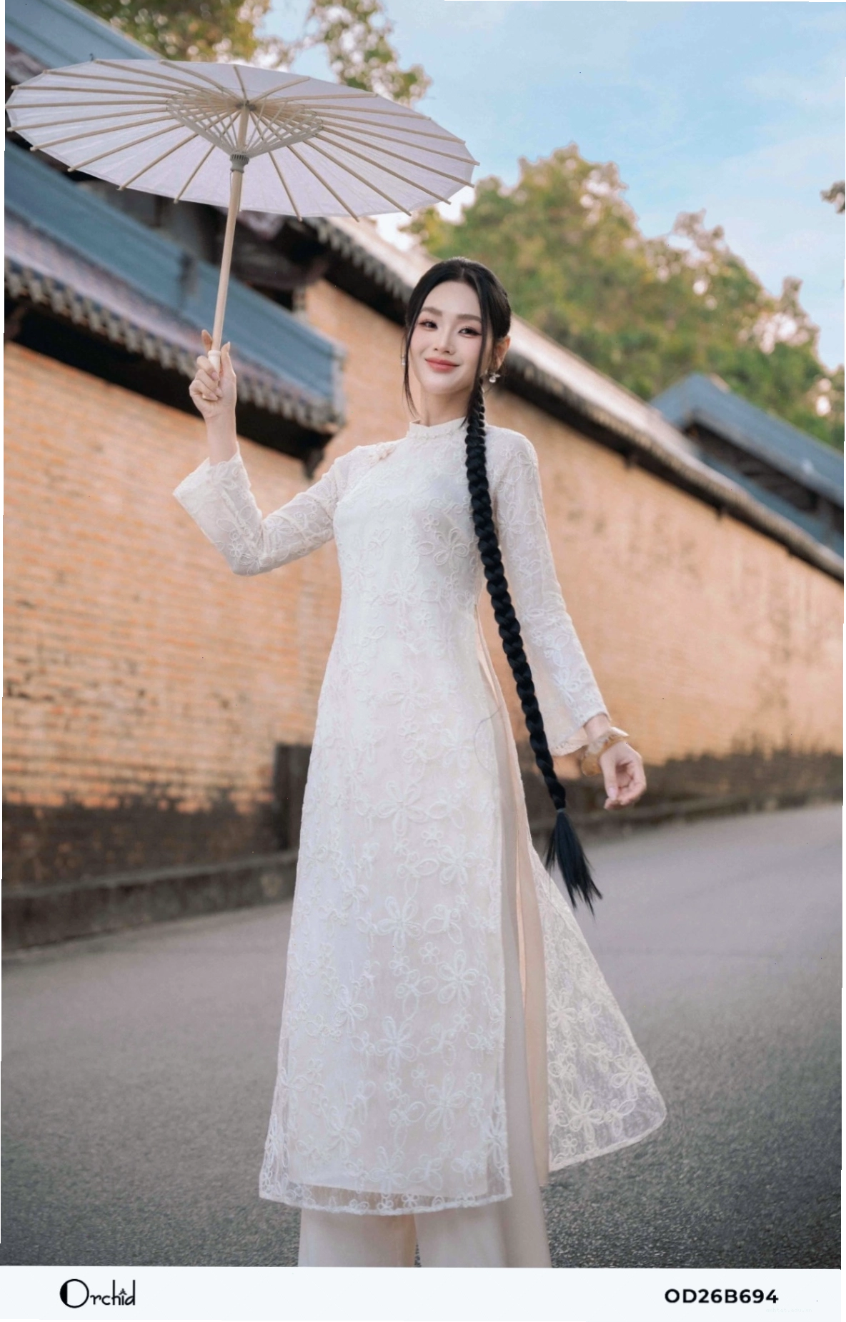 Sét bộ áo dài lưới ánh kim thêu hoa 3D màu xanh ngọc bích, dáng áo suông hiện đại